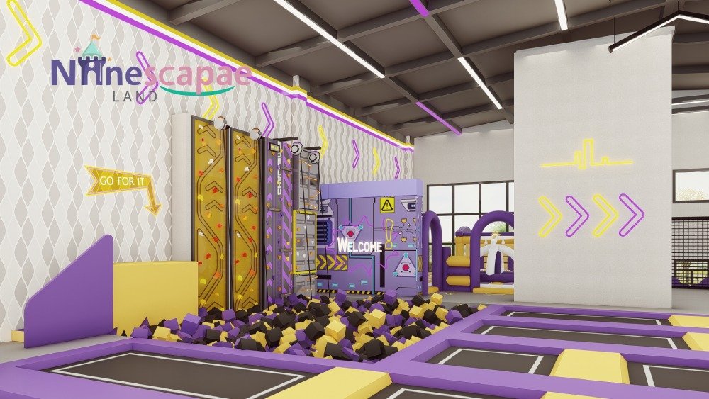 Indoor play area climbing wall purple theme