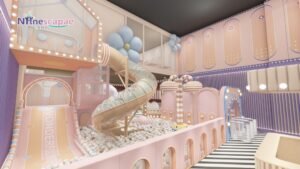 Pink pastel indoor playground spiral slide with flower decor Pink pastel indoor playground spiral slide with flower decor